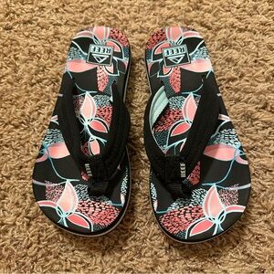Reef Black and Pink Floral Flip Flops
